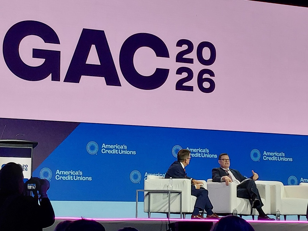 Scott Simpson of America’s Credit Unions speaks with NCUA chair Kyle Hauptman during a fireside chat on stage.